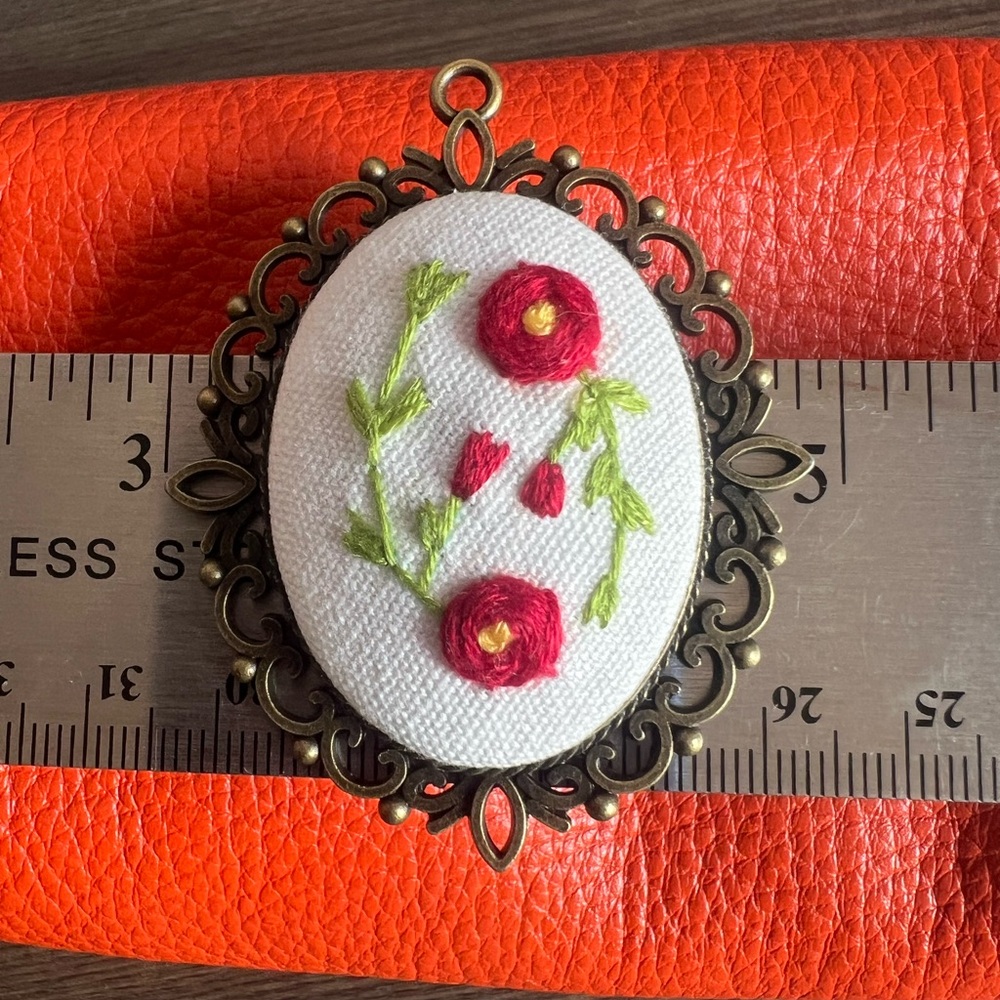 Floral Embroidered Pendant with Bronze Frame